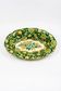 Longwy cup in cloisonné enamels on a green background, polychrome floral decoration and gold