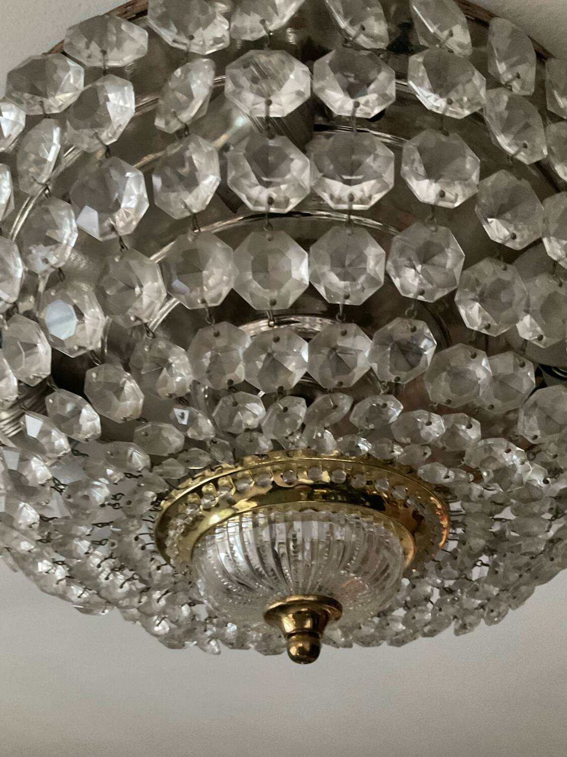 Vintage ceiling light with pendants and brass.