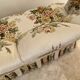 Napoleon III floral toad sofa with boudoir spirit and sliced backrest.