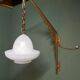 Early 20th century art deco wall lamp with brass bracket and opaline glass shade