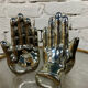 Pair of chrome ceramic hand bookends from the 70s and 80s