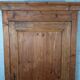 Antique rustic wardrobe in raw wood