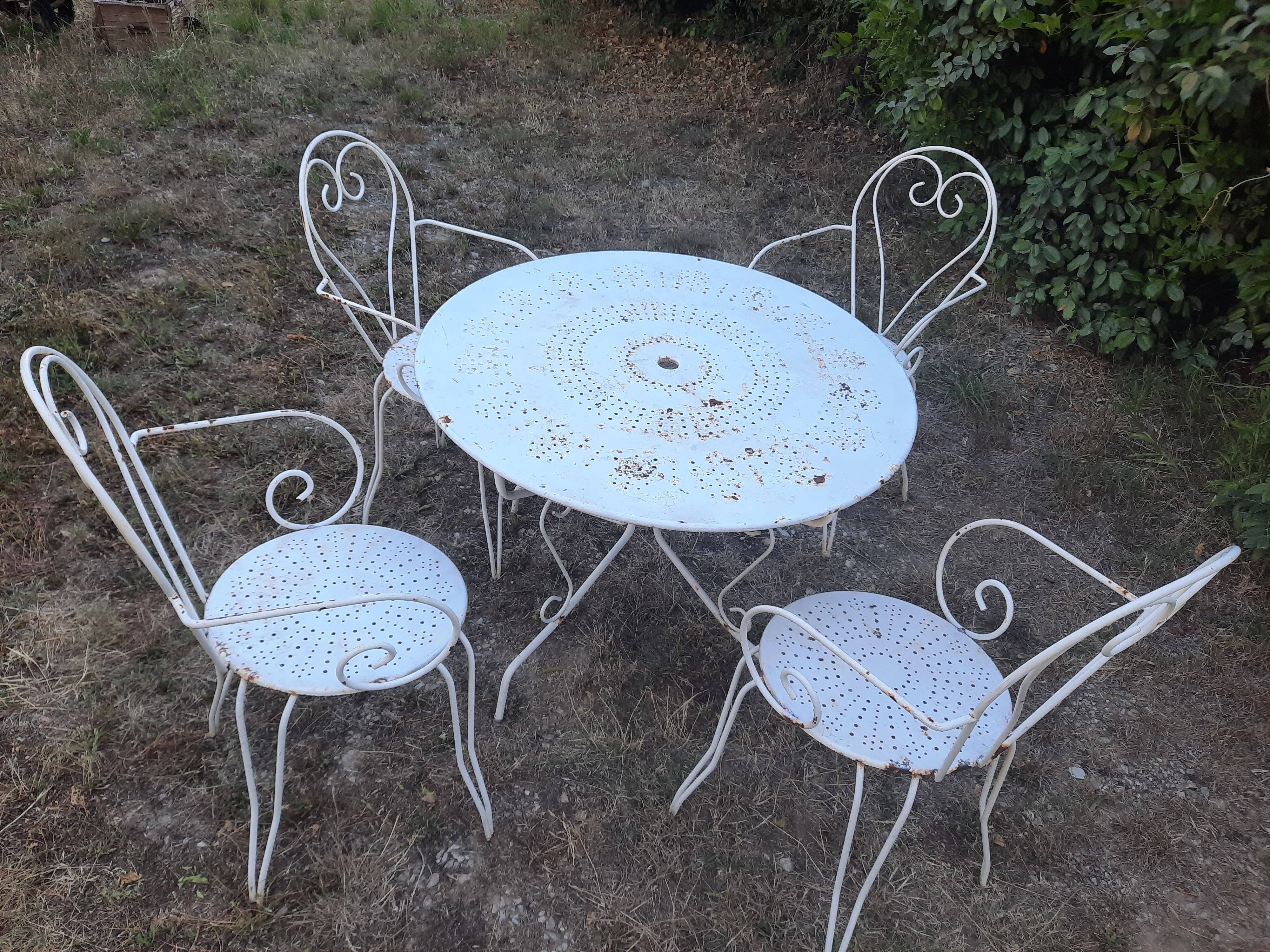 Antique wrought iron garden furniture
