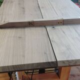 Exceptional dining table in solid walnut.