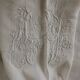 Antique linen sheet with days, embroideries and monograms worked