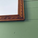 Ancient mirror in carved wood and mercury  48x63cm
