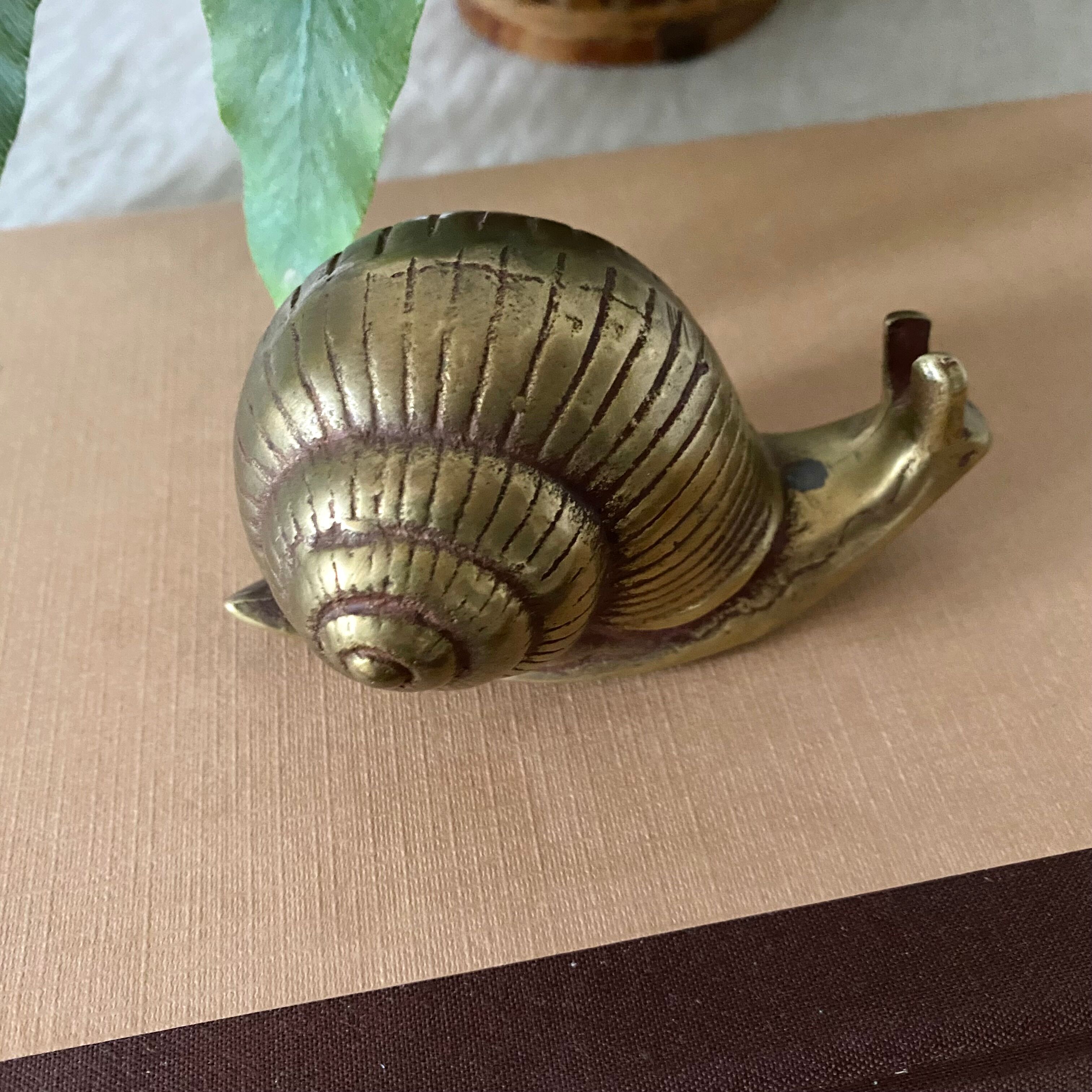 Golden brass snail