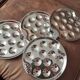 Set of 4 metal snail plates