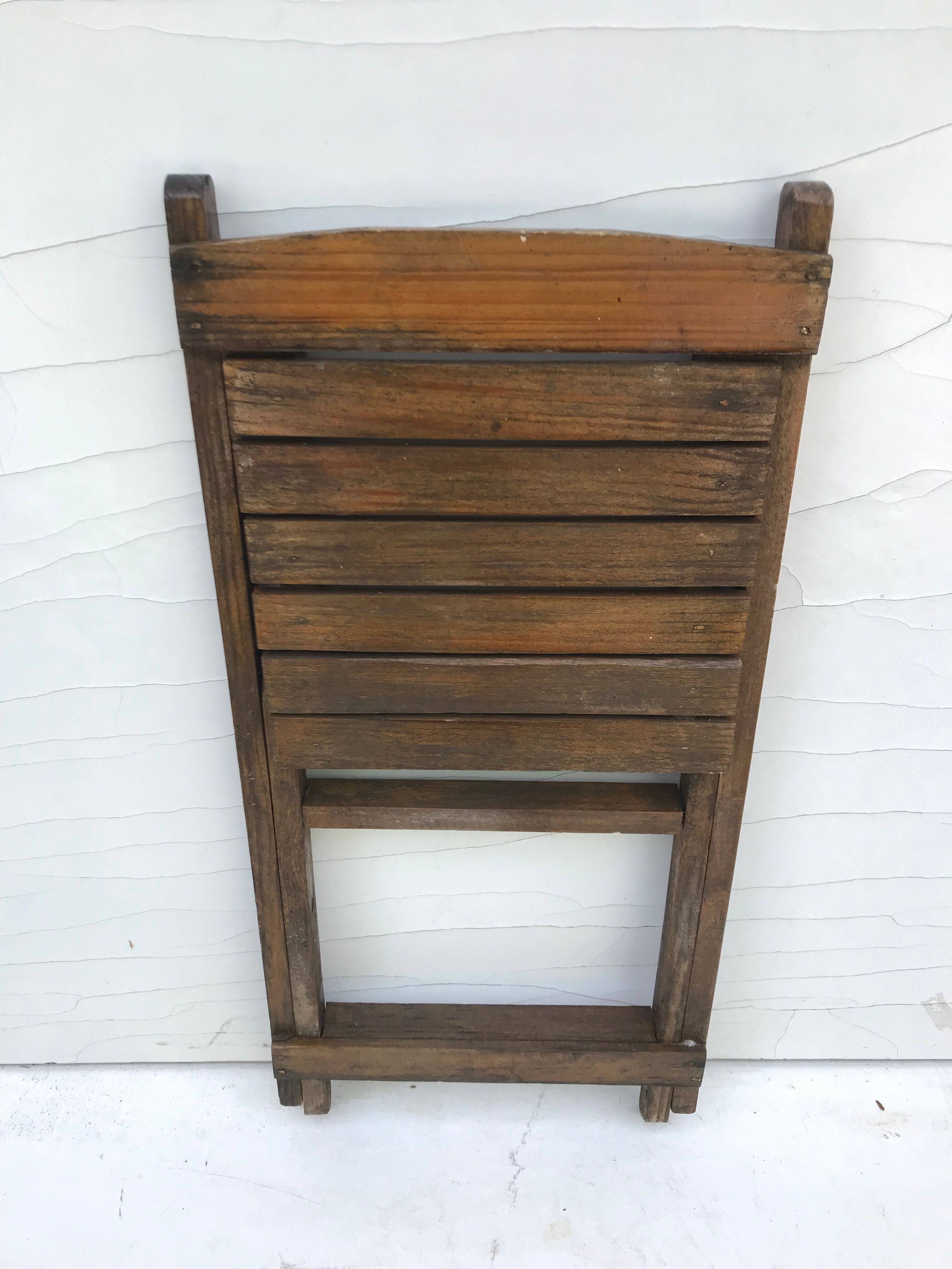 Old folding chair child in wood