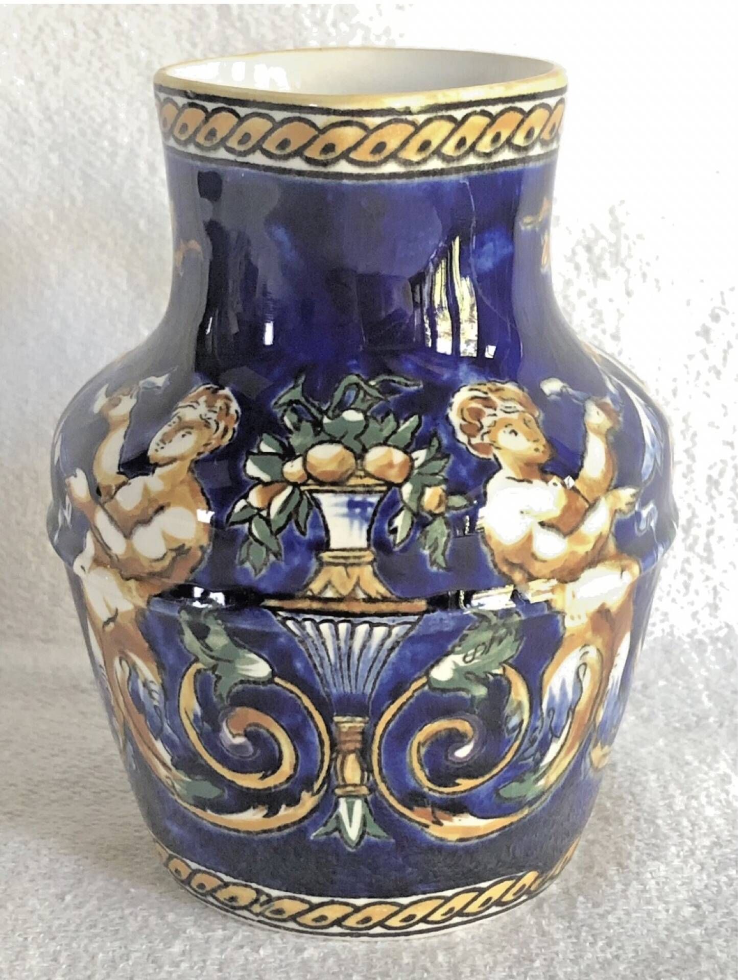 Old cream jug Gien Renaissance blue background 1938/1960