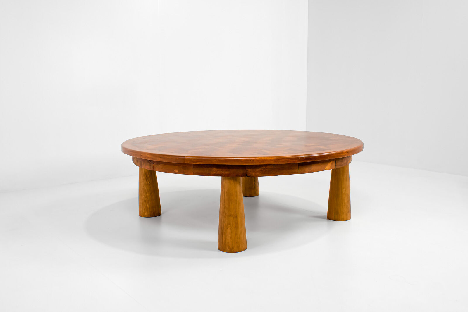 Round parquet coffee table with conical legs, spain