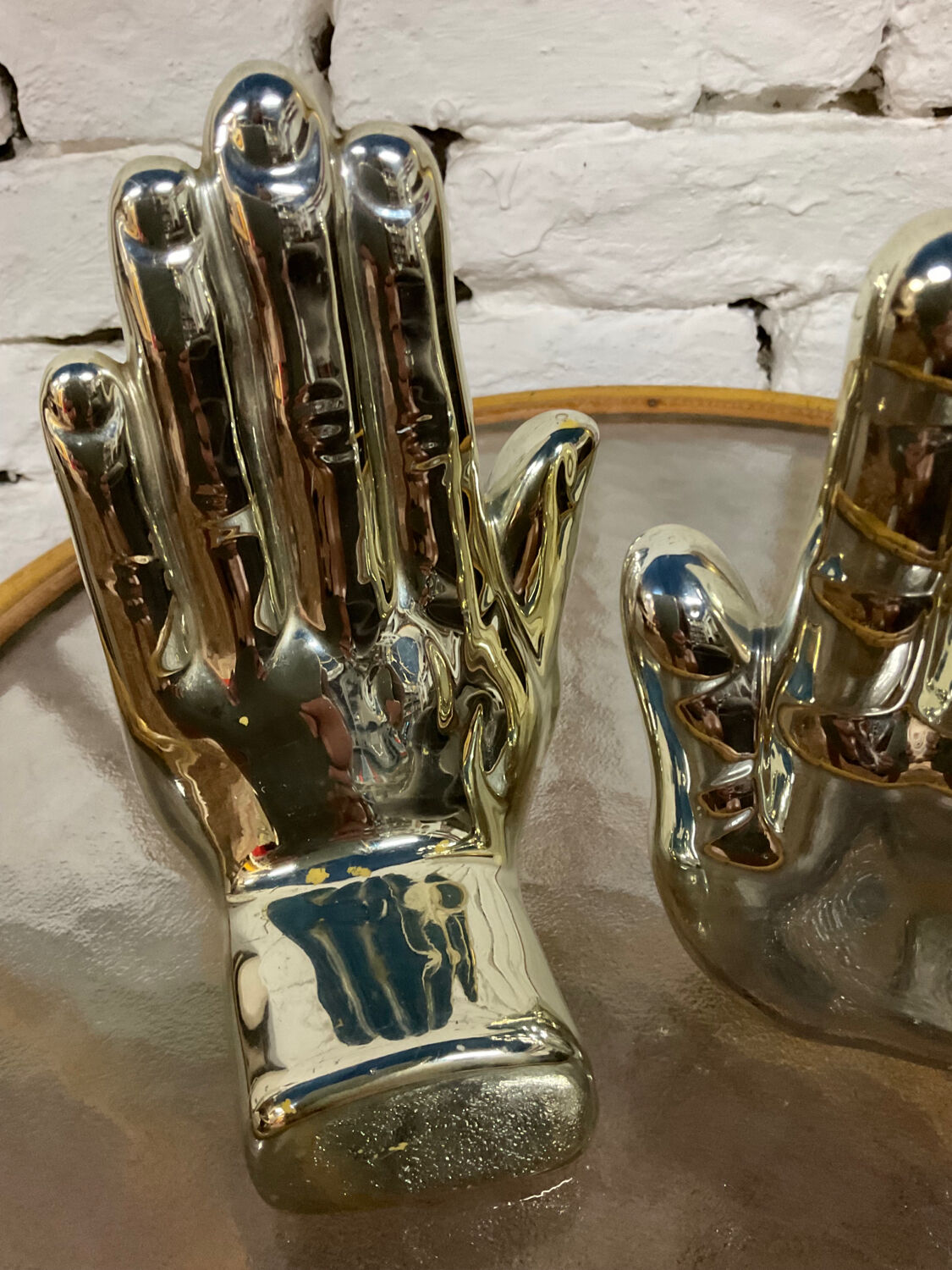Pair of chrome ceramic hand bookends from the 70s and 80s