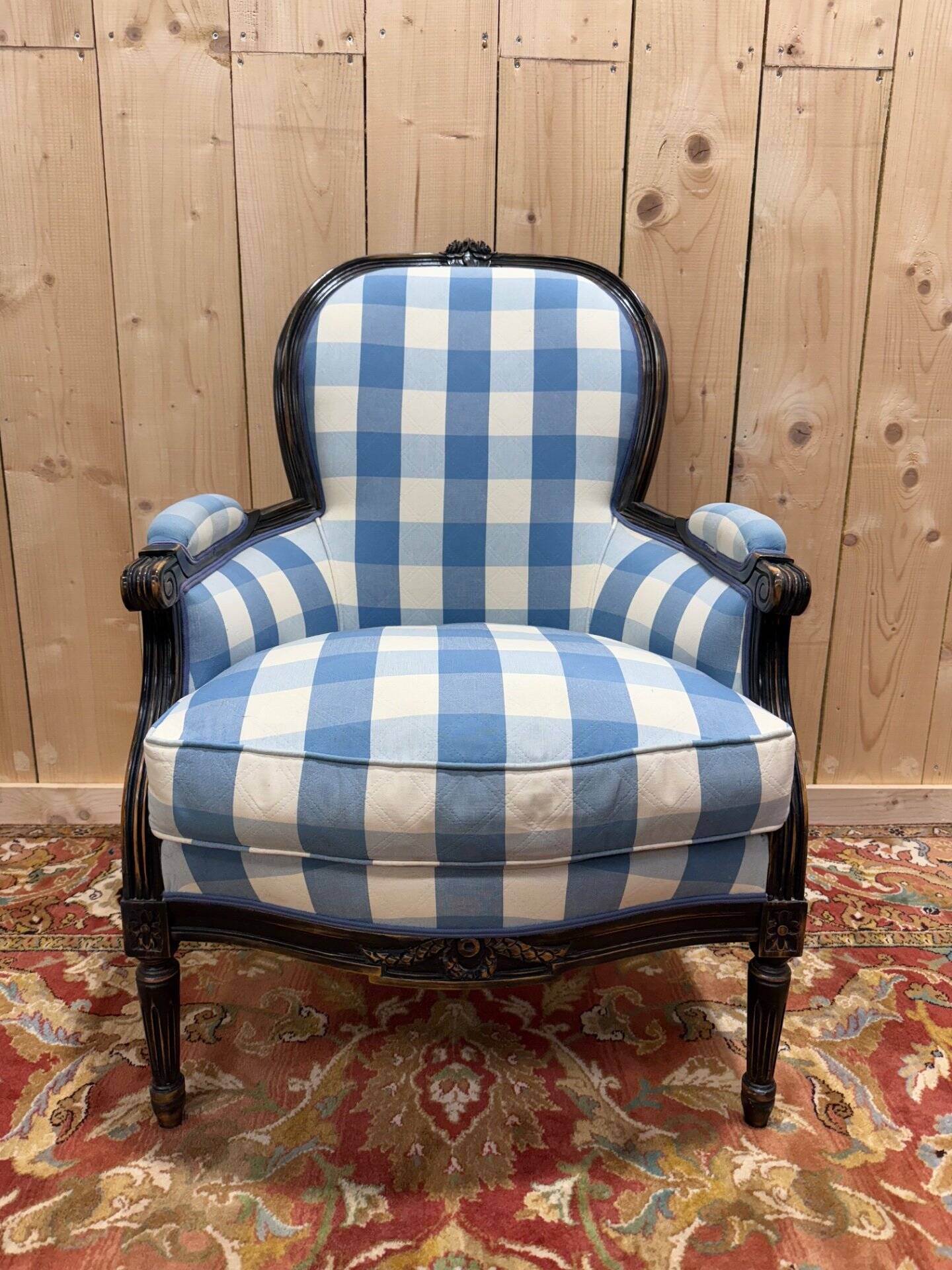 Louis XVI style bergère armchair in blackened wood