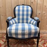 Louis XVI style bergère armchair in blackened wood
