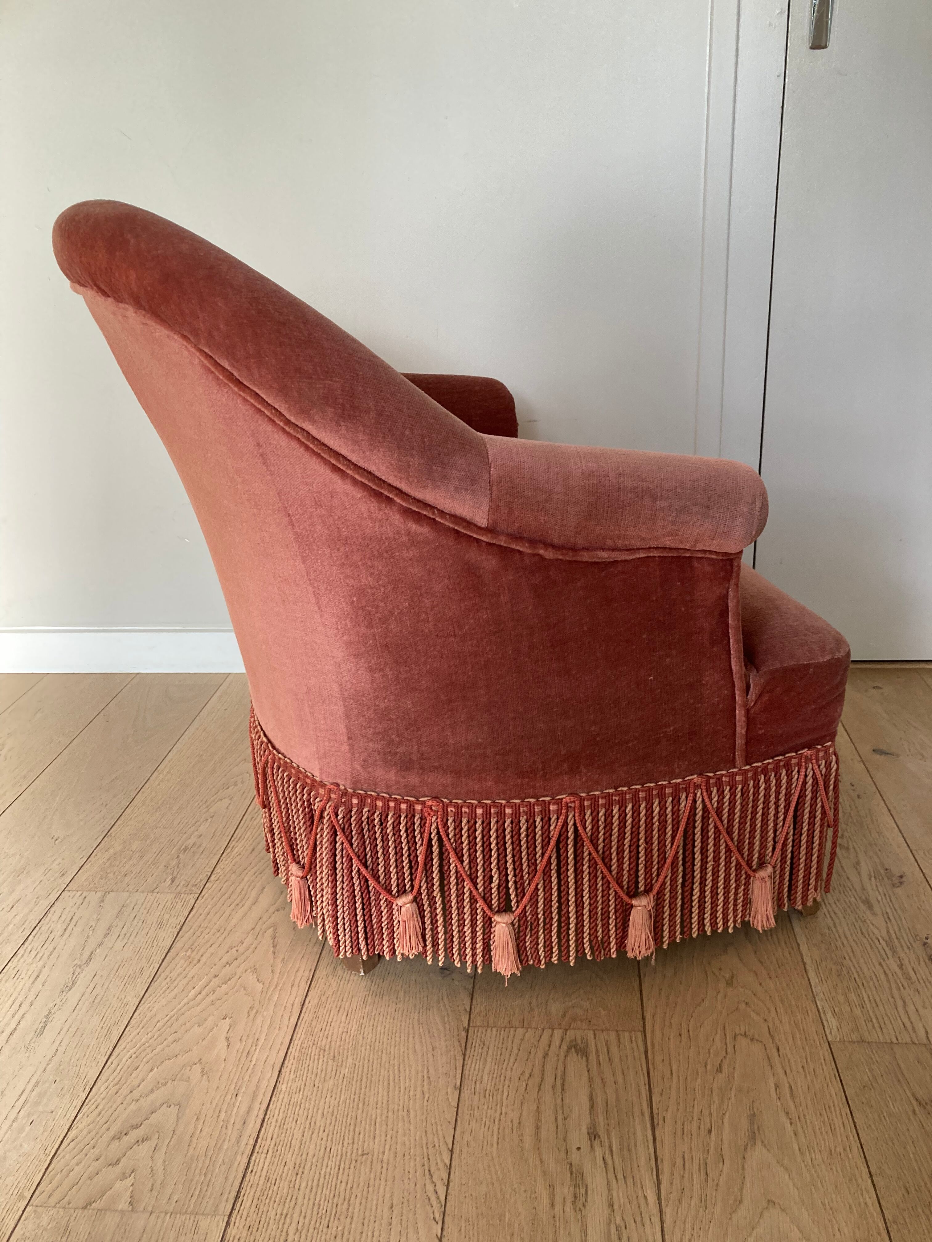 Pink velvet armchair