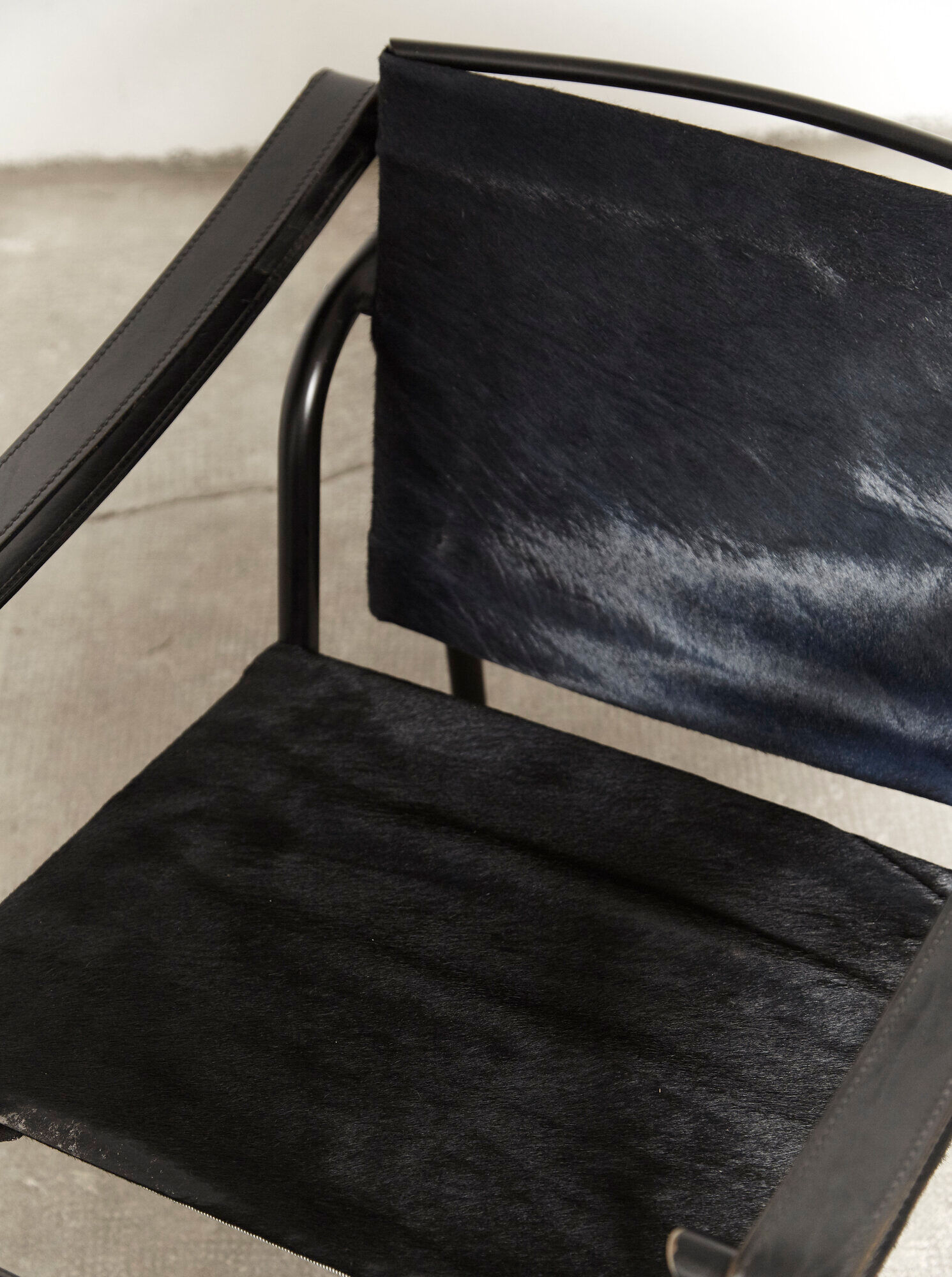 LC1 armchair by Le Corbusier, Perriand, & Jeanneret for Cassina