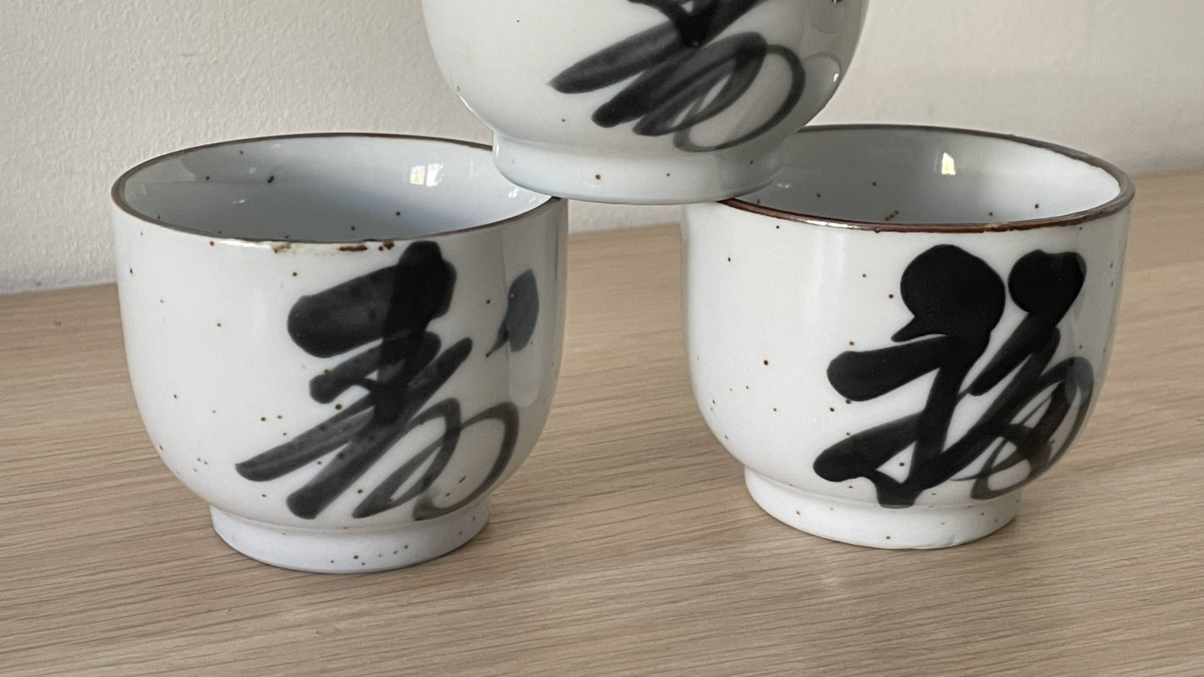 4 vintage stoneware cups