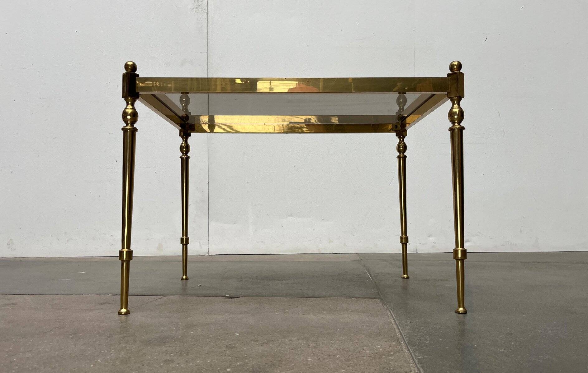 Mid-century Hollywood neoclassical brass and glass side tables or bedside tables from the 1950s, set of 2.