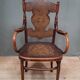 Curved wooden armchair Kohn