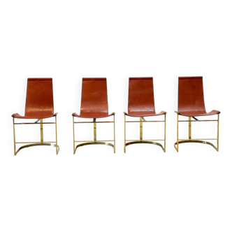 Set of four leather and brass Italian dining chairs