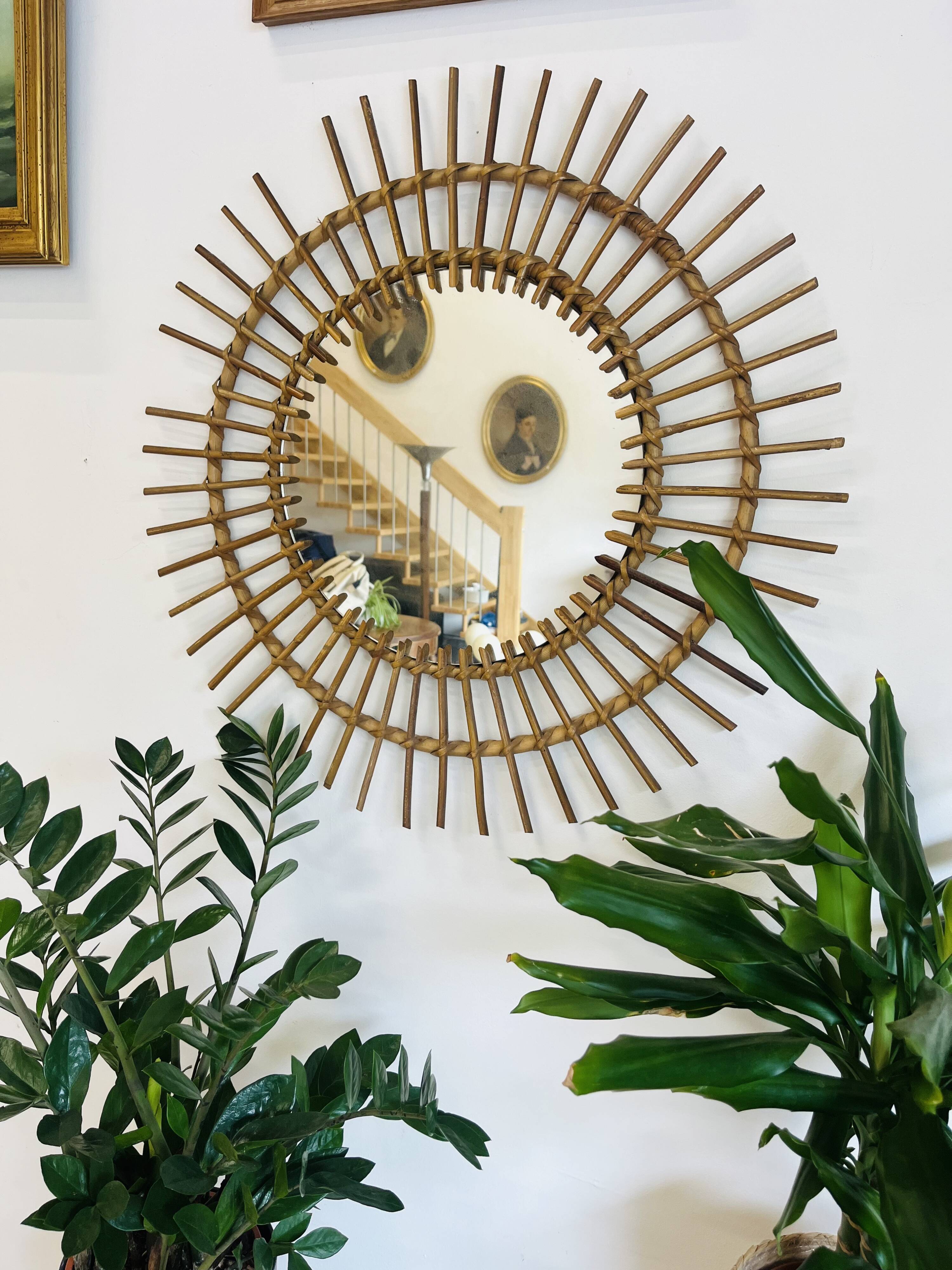 Vintage woven rattan sun mirror from the 60s