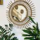 Vintage woven rattan sun mirror from the 60s