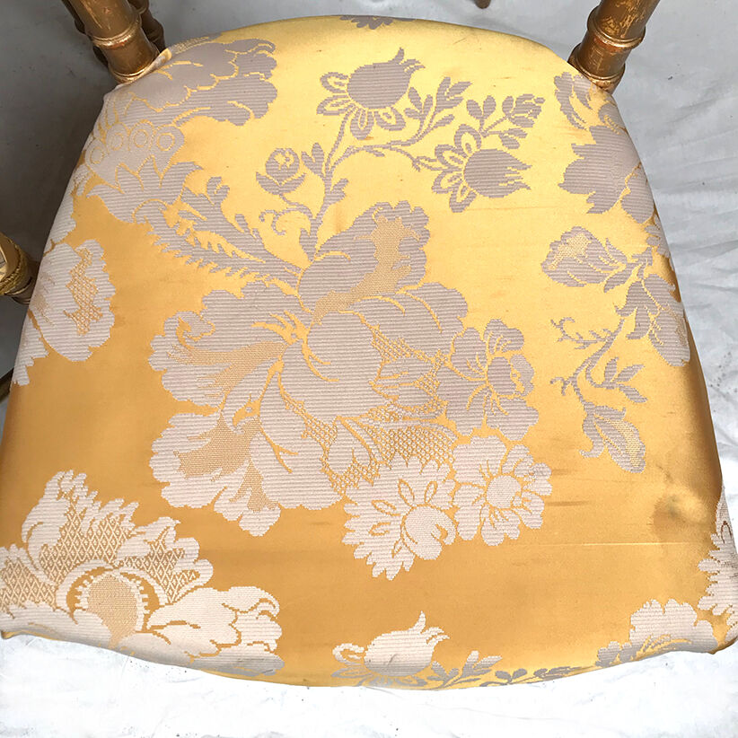 Series of four chairs Napoleon III, gilded wood