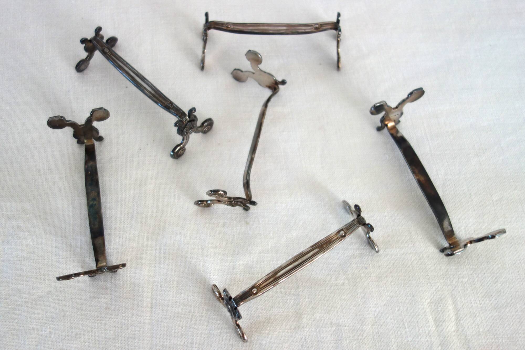 6 porte-couteaux en métal argenté Christofle