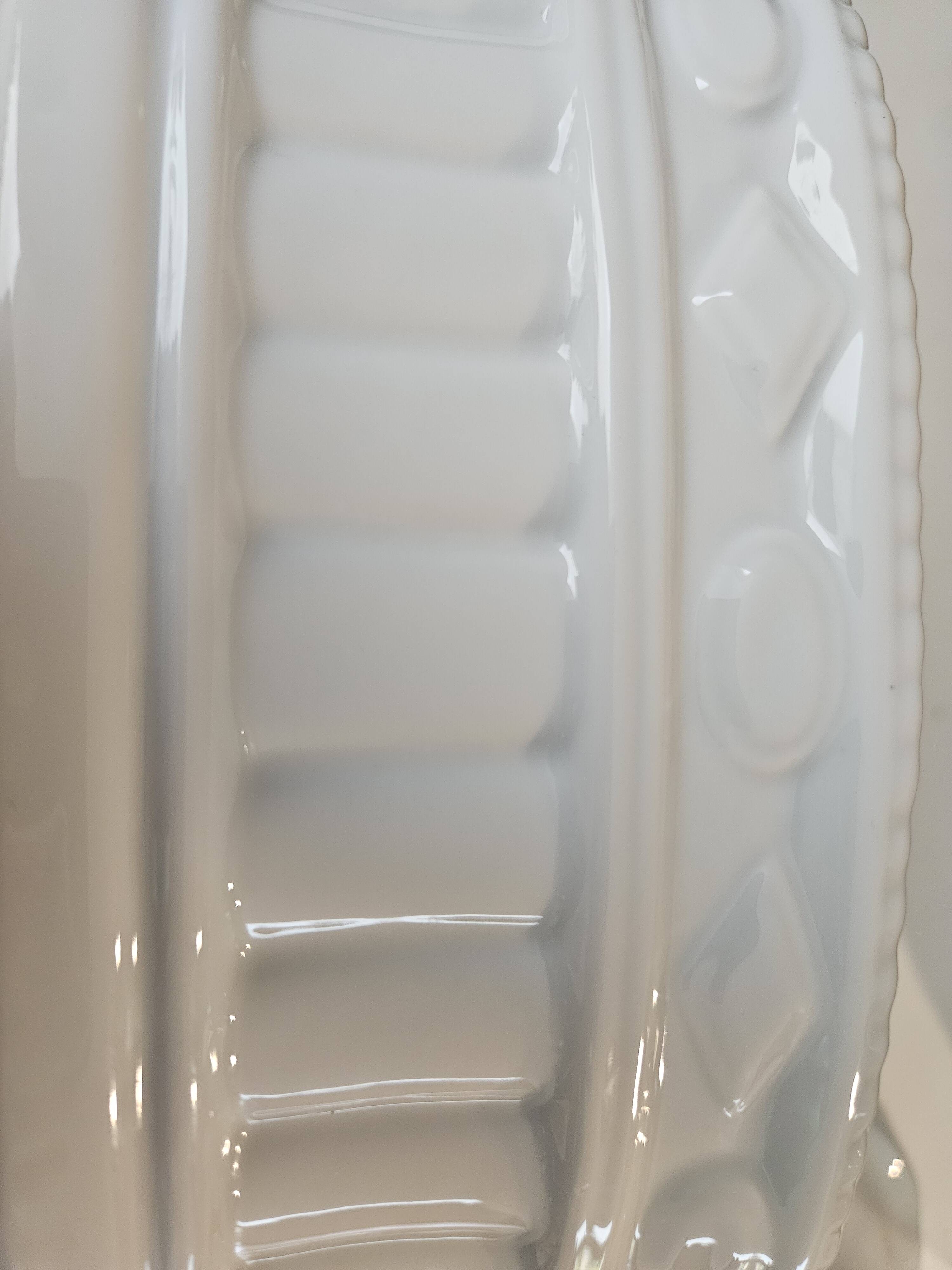 White porcelain terrine with white goose