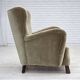 Fauteuil danois des années 1960, velours vert, pieds en bois de chêne.