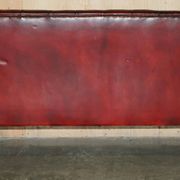 Victorian Chesterfield leather sofa with carved lion heads.