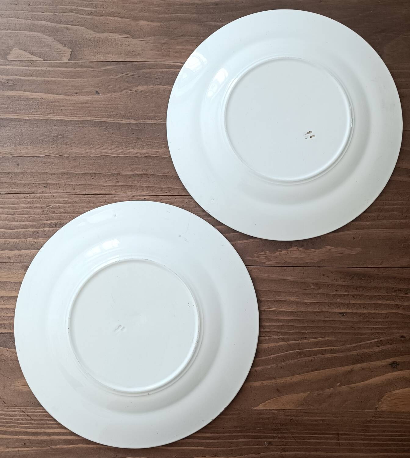 4 mismatched iron earth plates