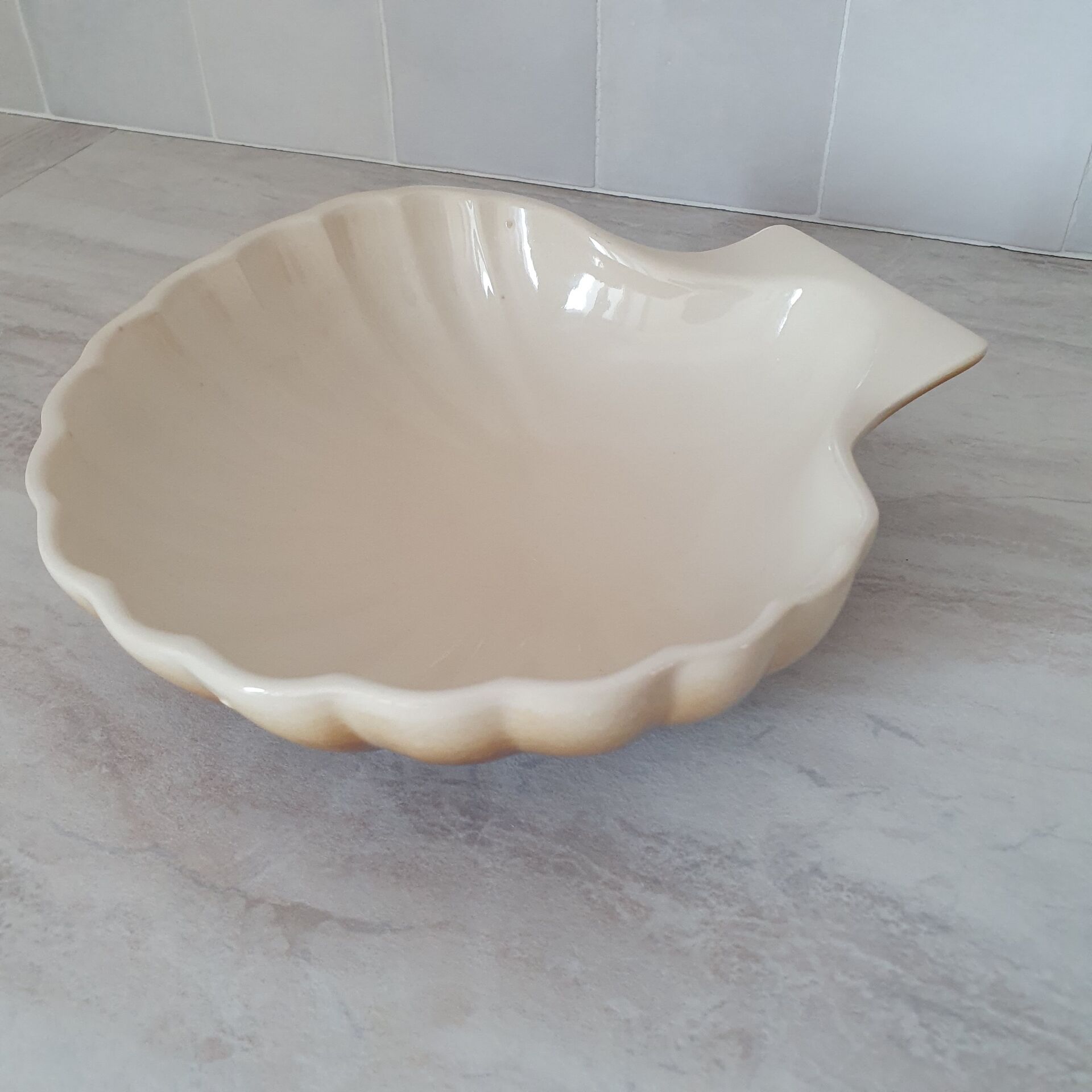 Brown and white ceramic shell bowl