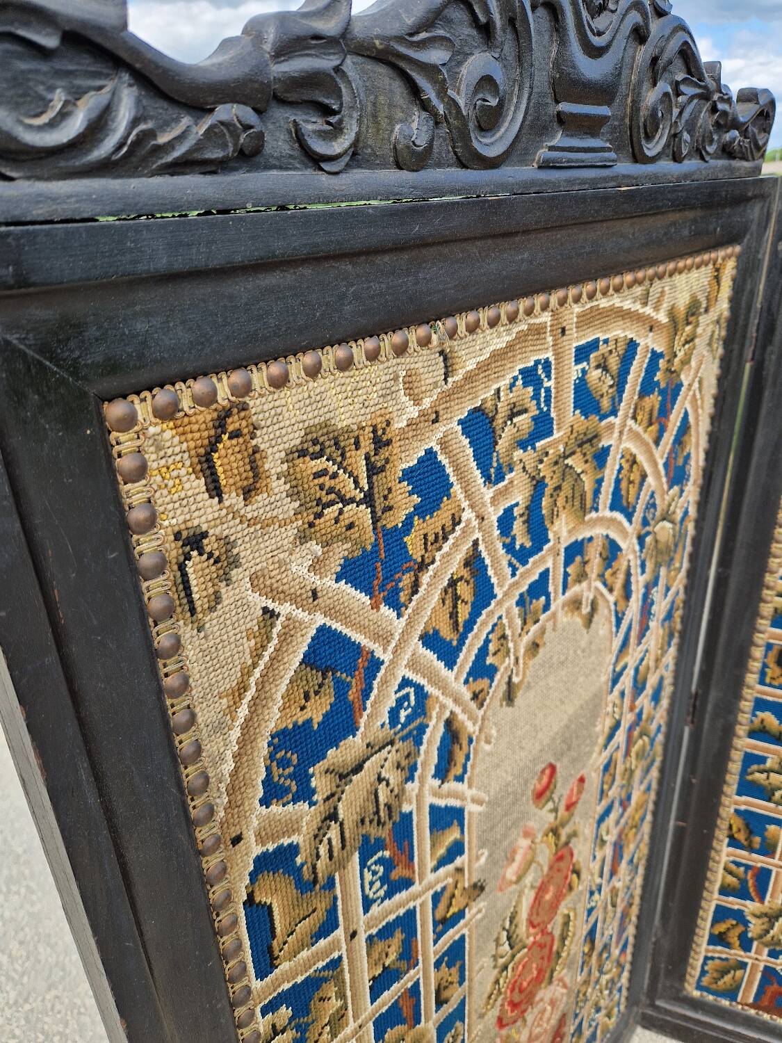 Folding screen in black-painted wood, 19th century