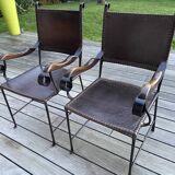 Pair of wrought iron armchairs