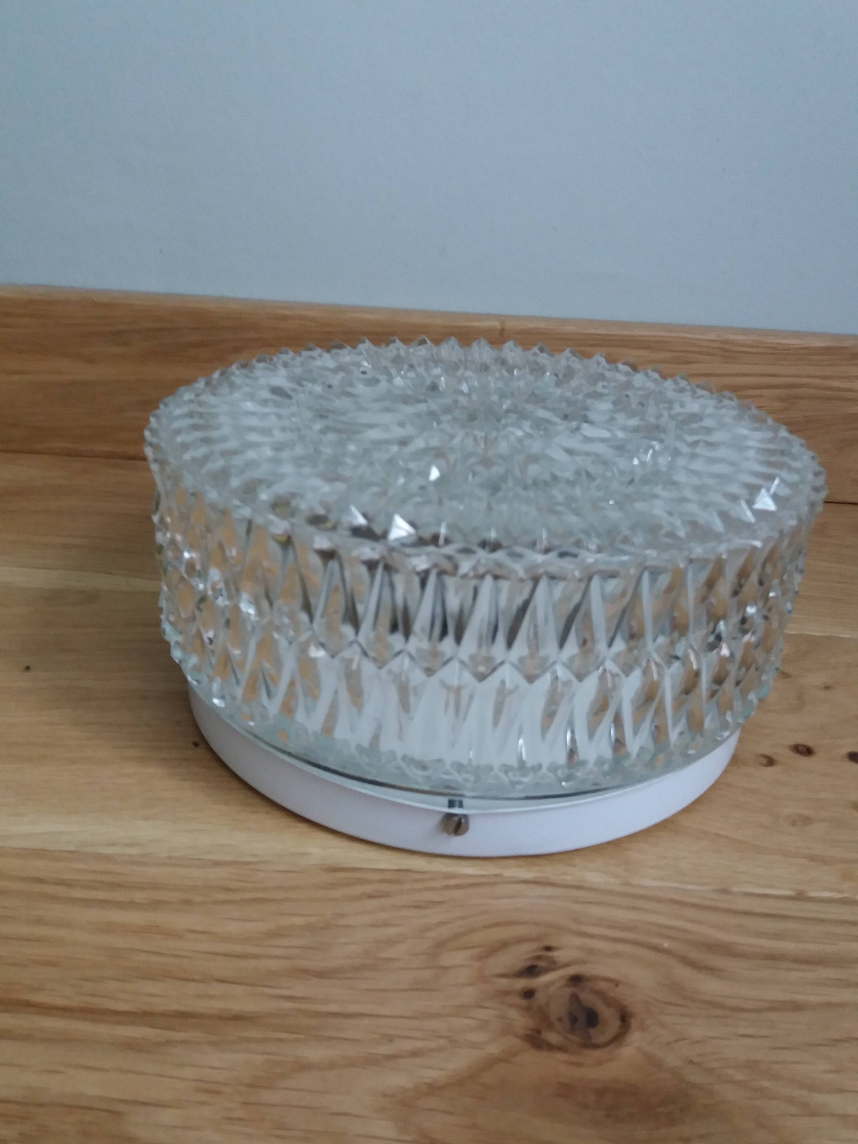 Globe ceiling light in molded glass
