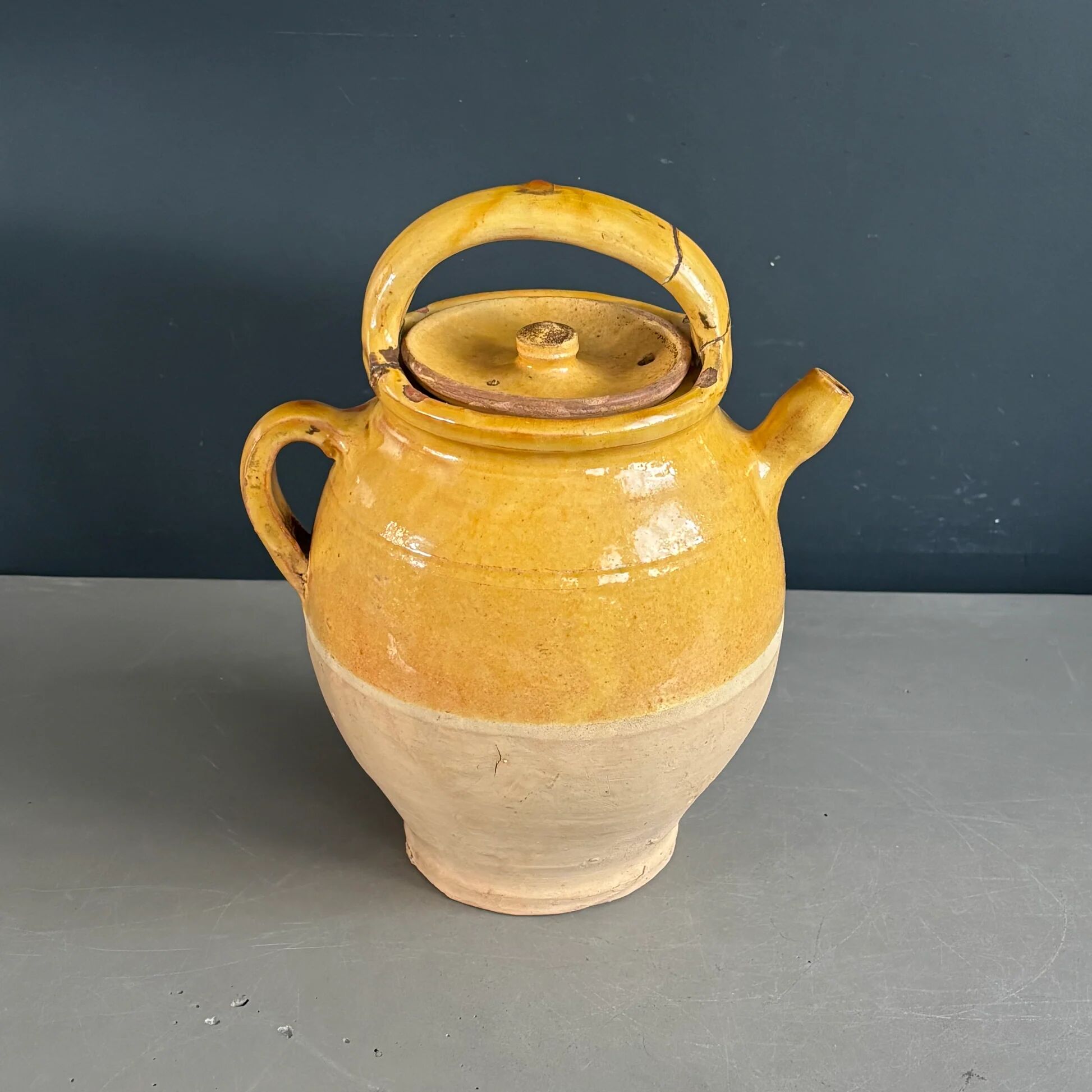 Ancient oil jar in glazed terracotta