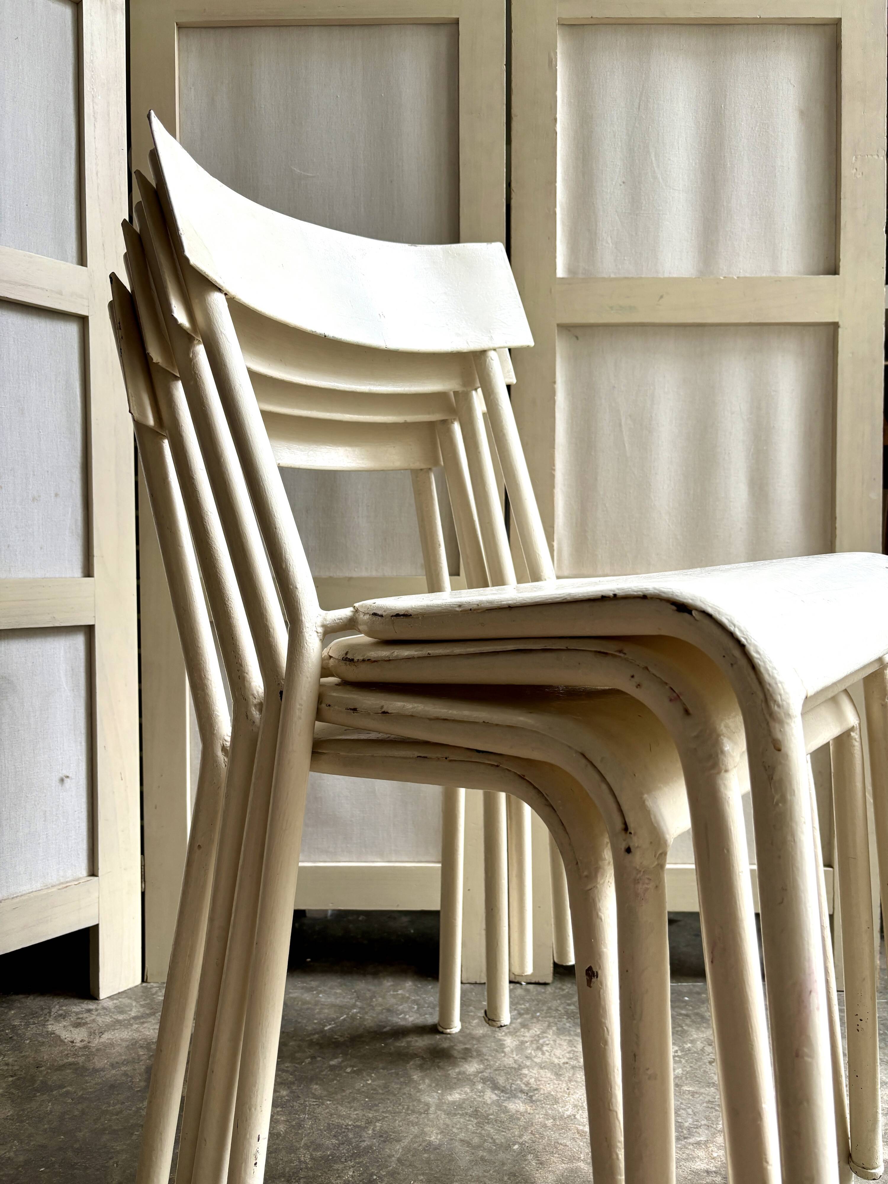 4 beige metal garden chairs