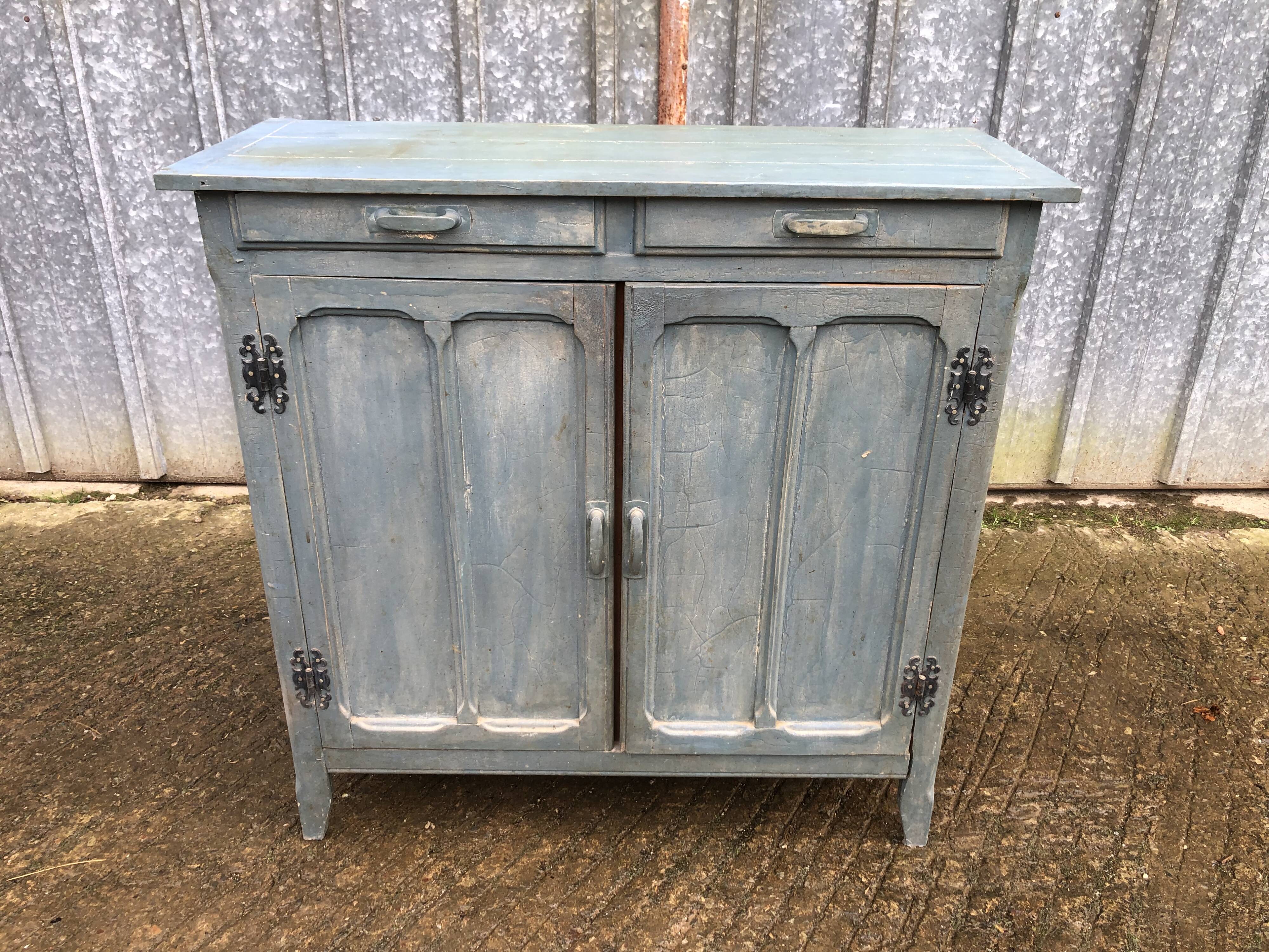 Parisian sideboard painted in blue with 2 doors and 2 drawers.