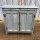 Parisian sideboard painted in blue with 2 doors and 2 drawers.
