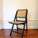 Vintage folding chair from the 60s wood and cannage