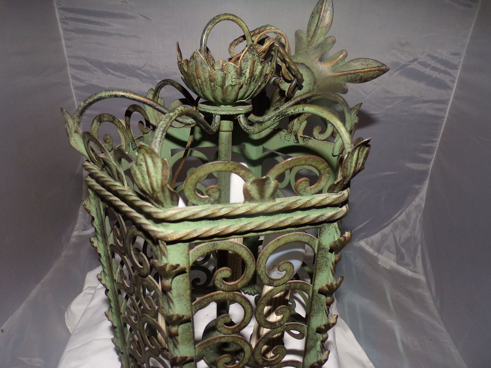 Lantern Cage 3 green lacquered metal lights work neatly from the 70s