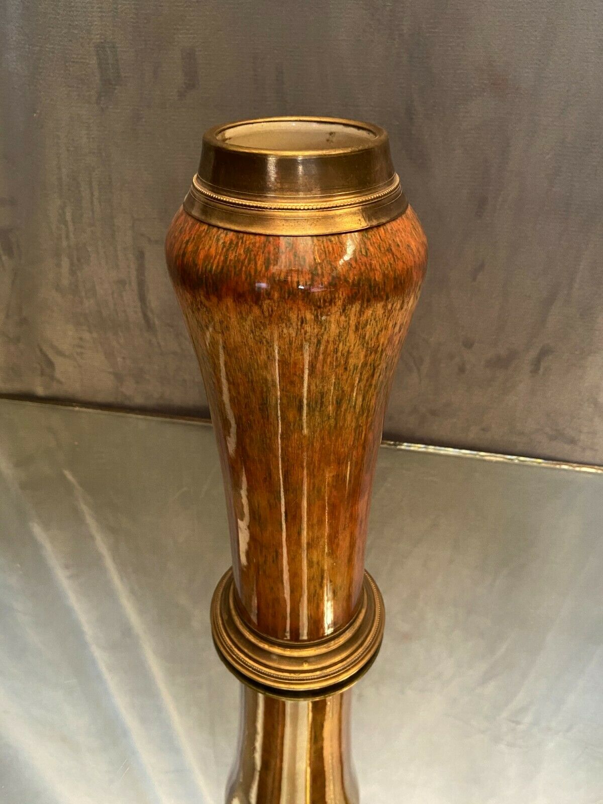 Porcelain vase signed Sèvres on bronze frame