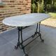 Bistro table in cast iron and marble from the art nouveau period.
