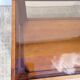 Table basse vintage bois et verre fumé 1970