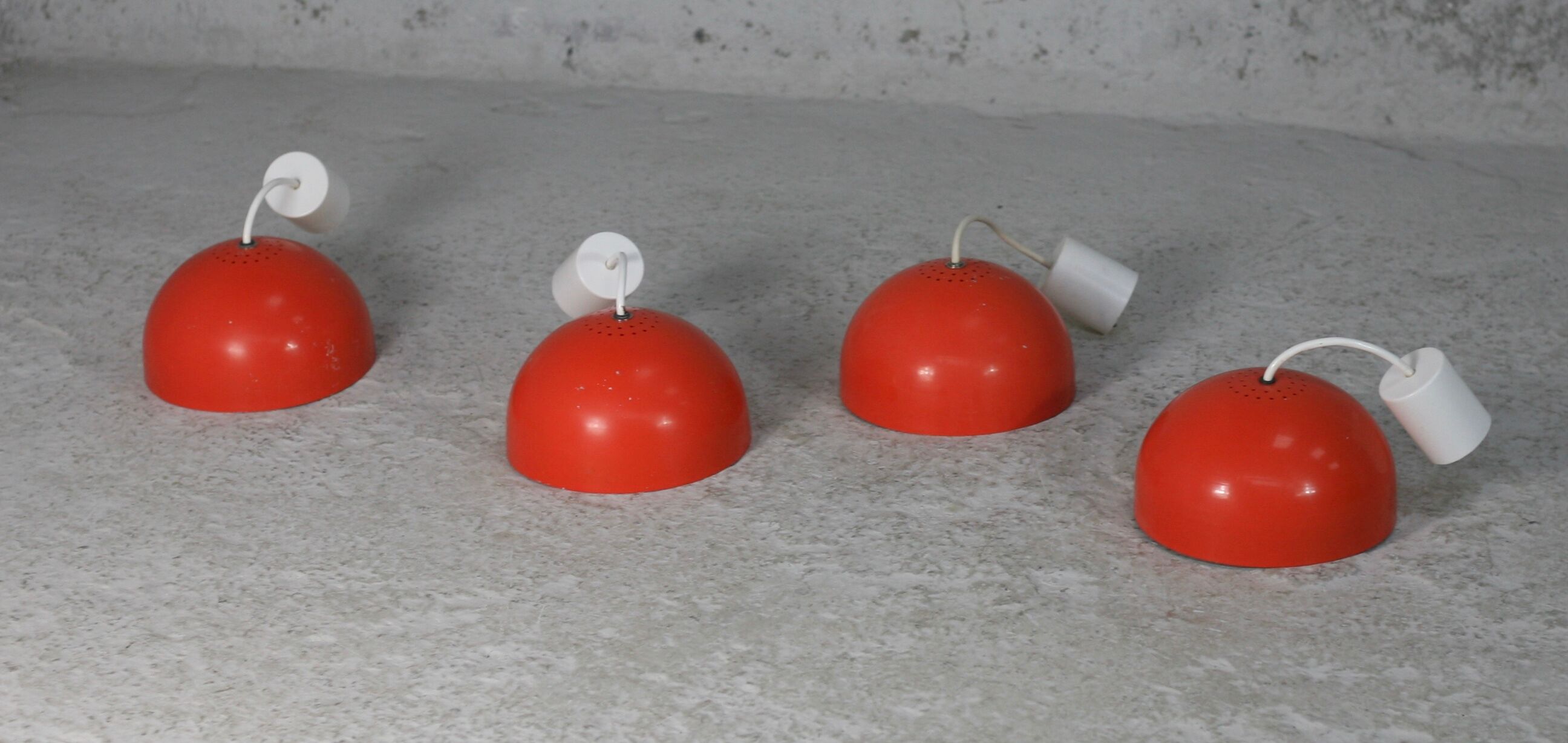 Set of 4 "spring" hanging lamps, orange steel, France, circa 1970