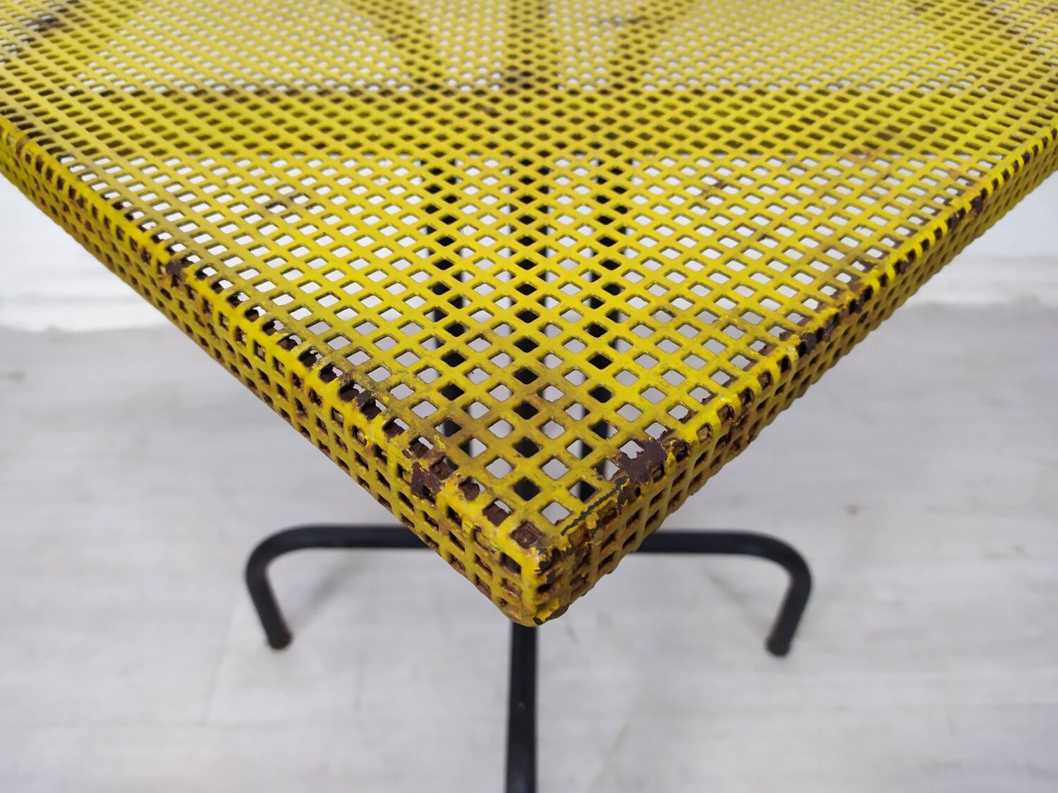Vintage perforated metal bistro table