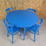 round table with 4 chairs and 2 extensions