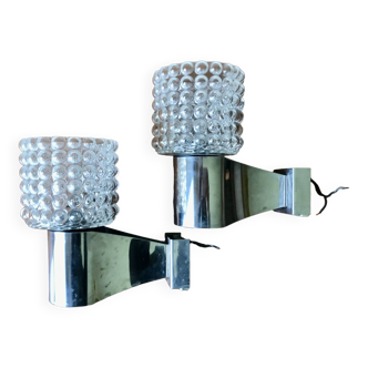 Pair of chrome and glass wall lights, circa 1970.