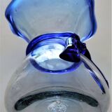 Biot vase in bluish transparent glass and blue scarf